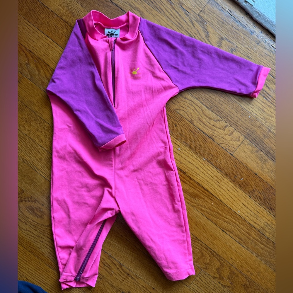 Nozone Pink and Purple rashguard one piece